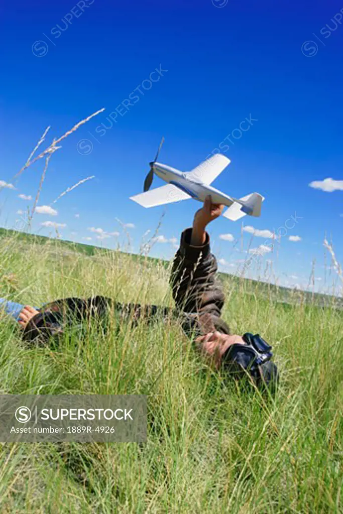 A child with a model airplane