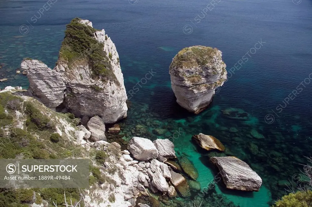 bonifacio, corsica, france, rock formations along the coastline