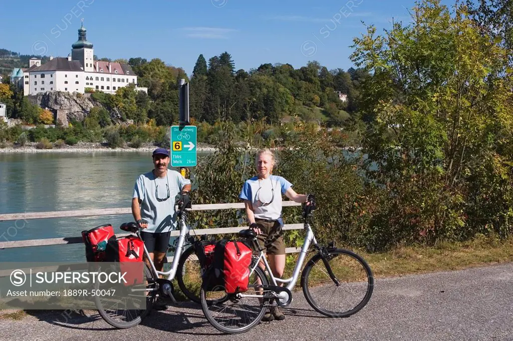 cyclists, danube river, ybbs, austria