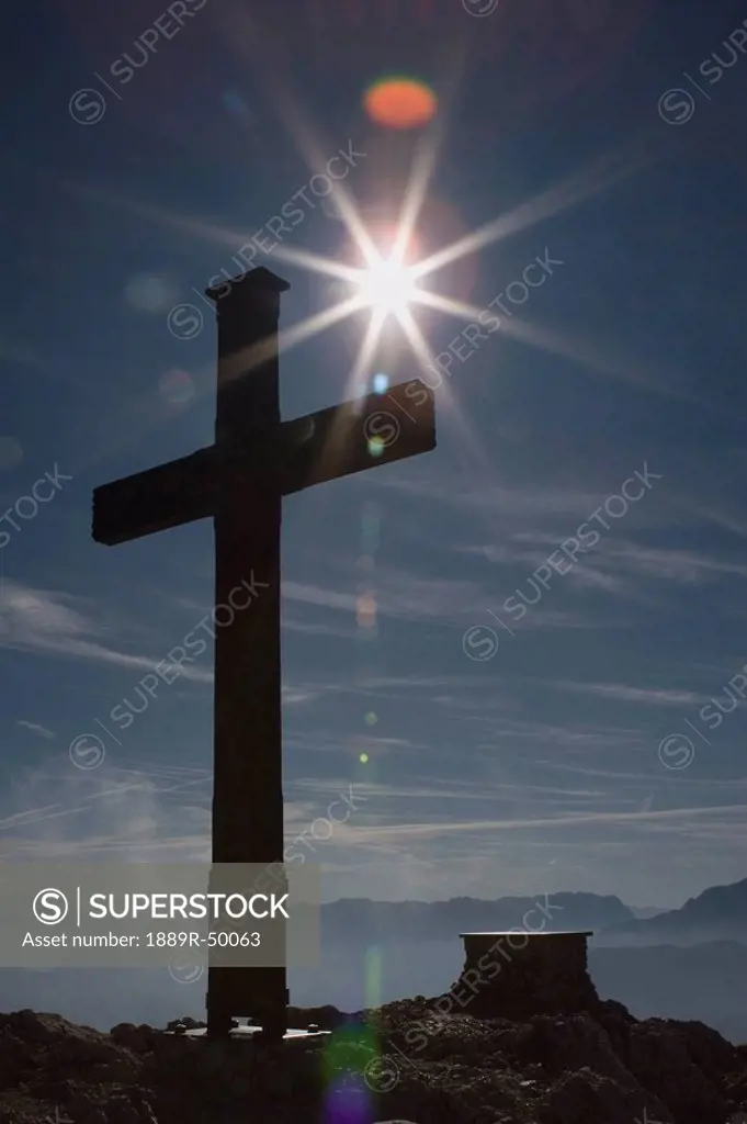 cross at the top of a mountain, grodig, salzburger land, austria