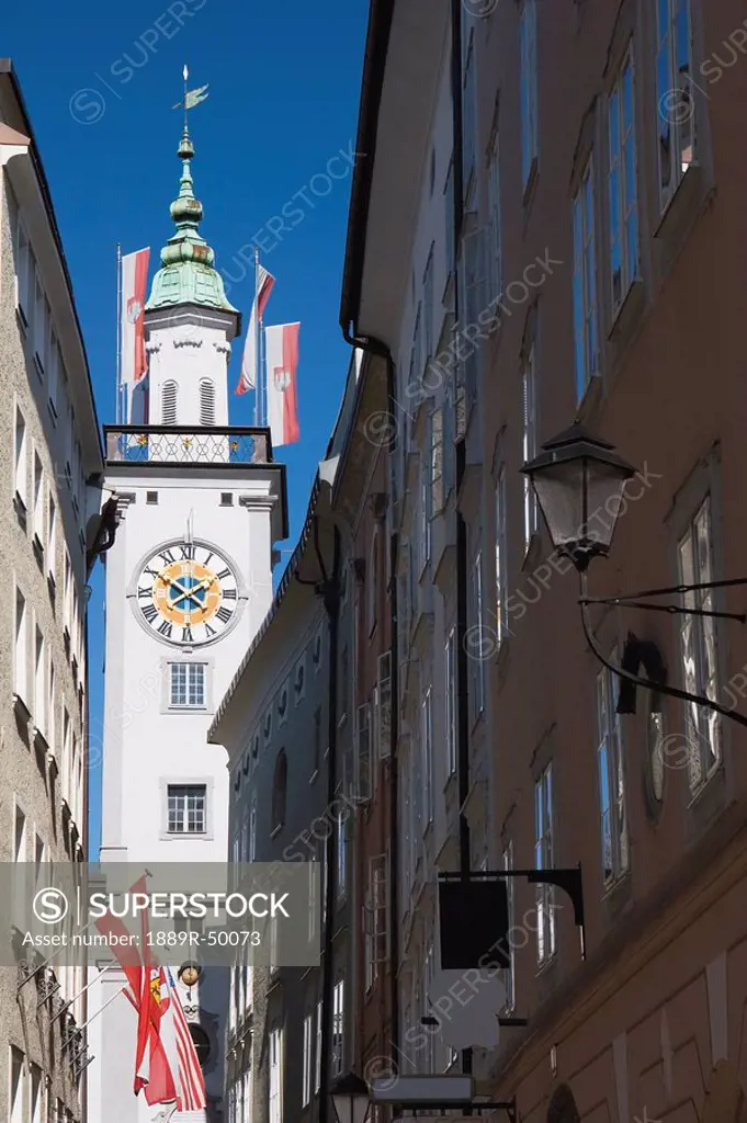 clock tower from a street, salzburg, salzburger land, austria