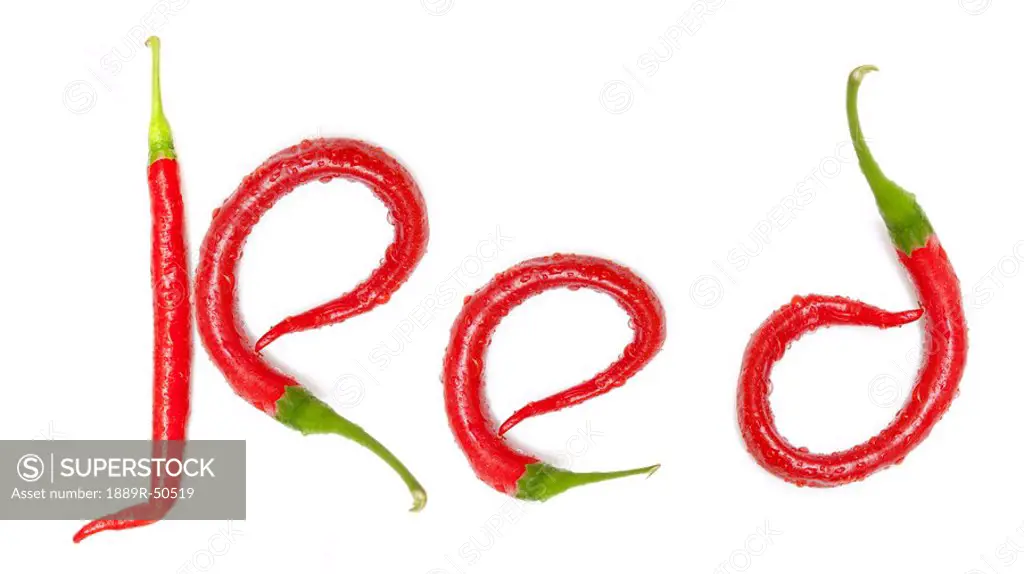 the word ´red´ made of red jalapeno peppers