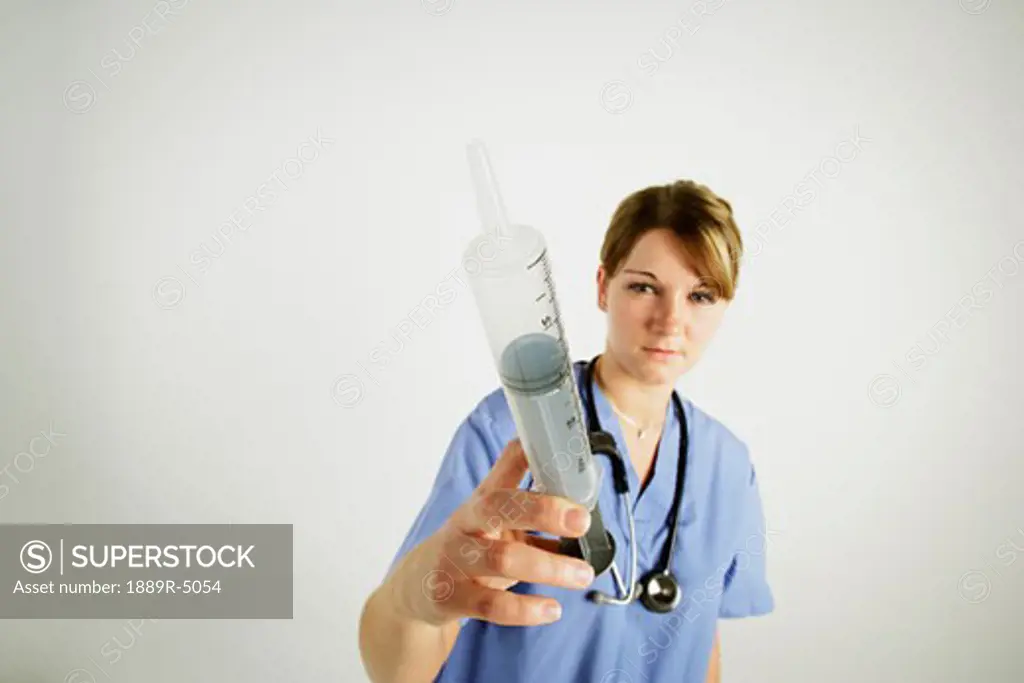 A nurse with a needle