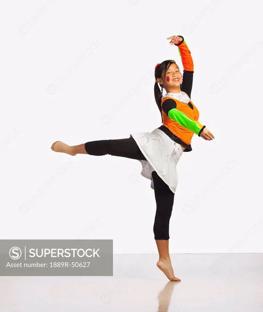 girl posing in ballet position
