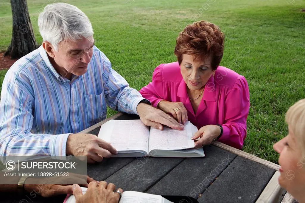 fort lauderdale, florida, united states of america, two couples studying the bible together