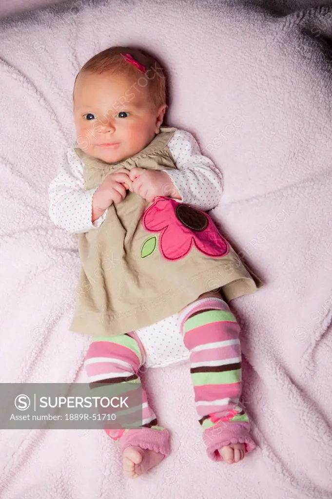 an infant girl all dressed up