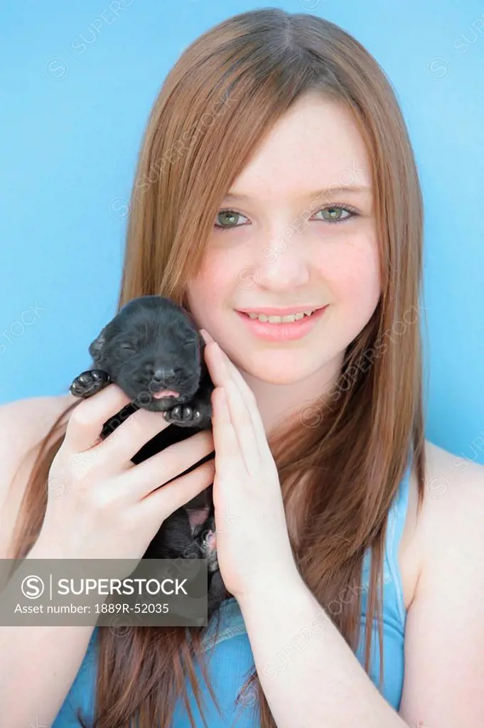a girl and a new puppy