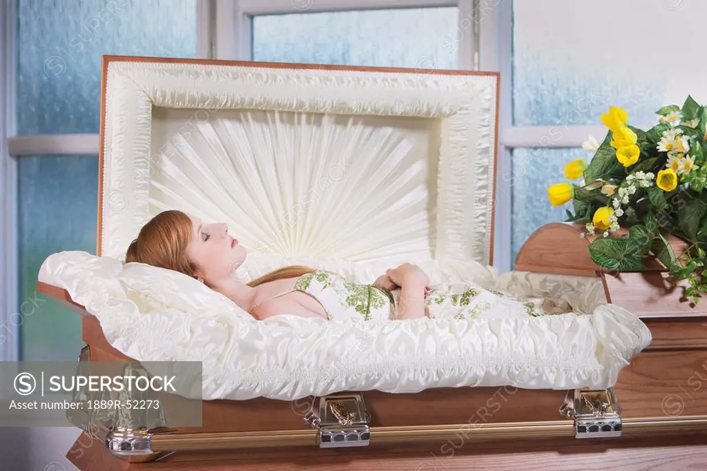 a deceased young woman in a coffin