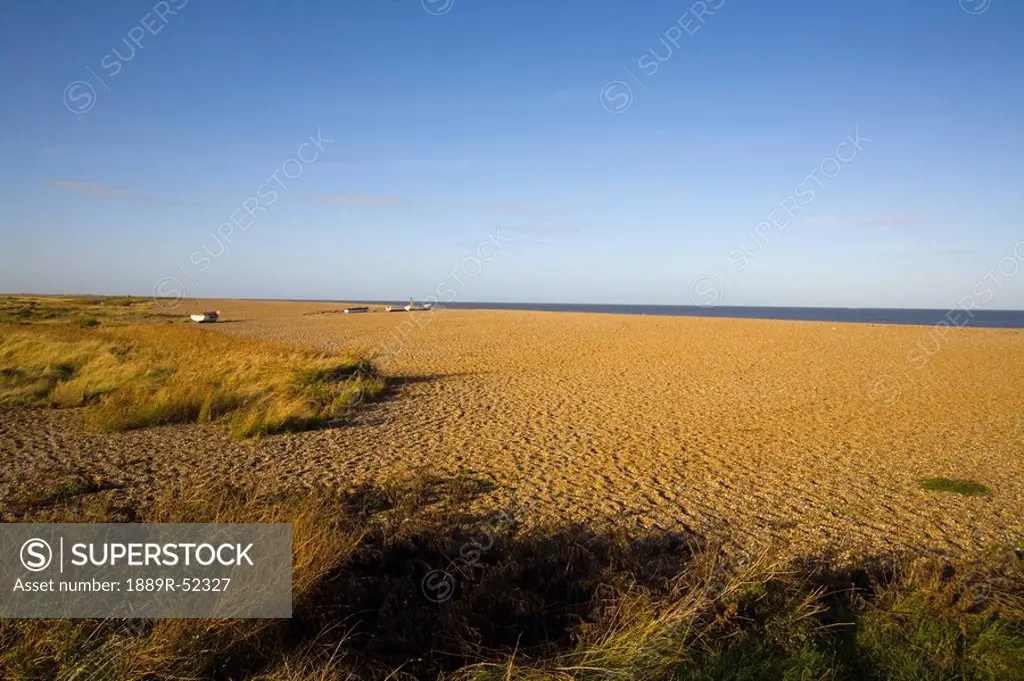 blakeney point, norfolk, england, furrows in the sand with a view of the north sea