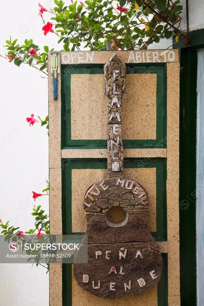 castellar de la frontera, andalusia, spain, a sign in the shape of a guitar saying ´live music´