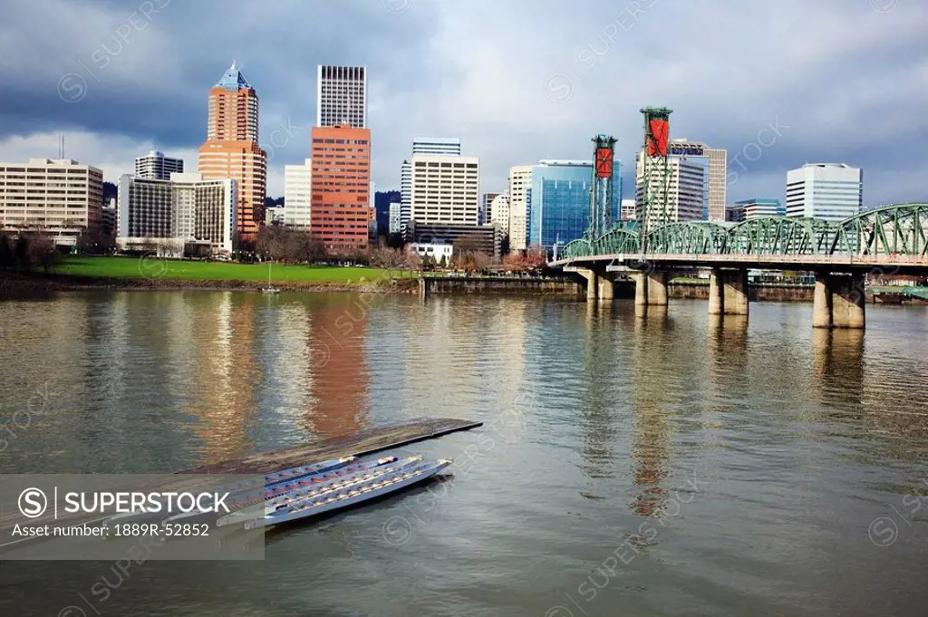 portland, oregon, united states of america, boats along a pier on willamette river and downtown portland