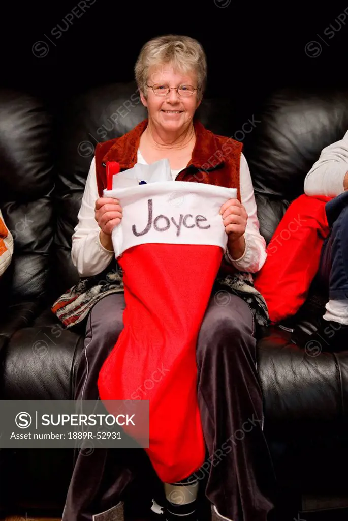 a woman holding her large stocking