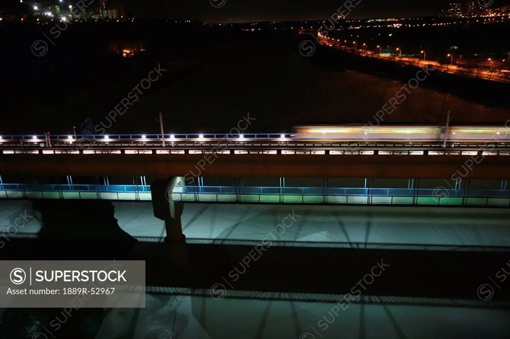 edmonton, alberta, canada, the high level bridge and the lrt bridge going over the north saskatchewan river at night