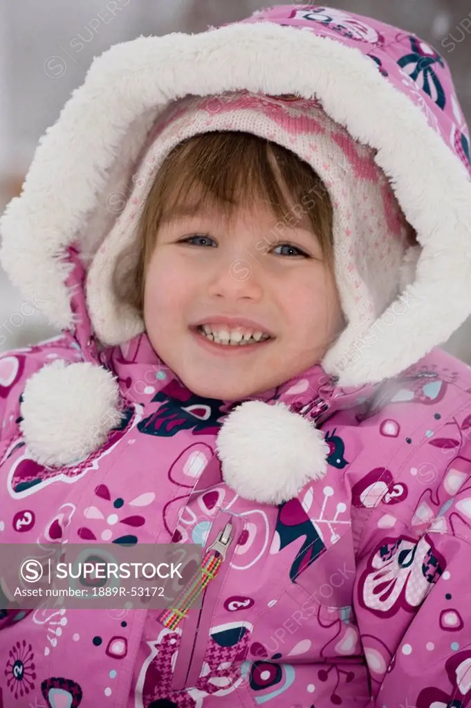 blairmore, alberta, canada, a girl wearing a winter coat with a hood