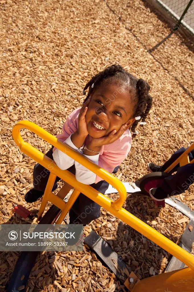 fort lauderdale, florida, united states of america, a young girl playing at a playground
