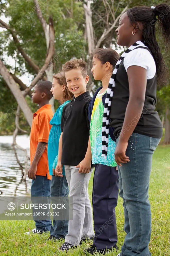 fort lauderdale, florida, united states of america, a group of preteens standing together in a park