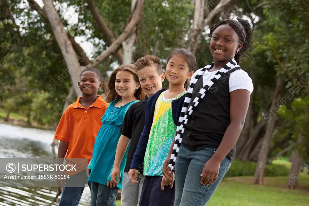 fort lauderdale, florida, united states of america, a group of preteens standing together in a park