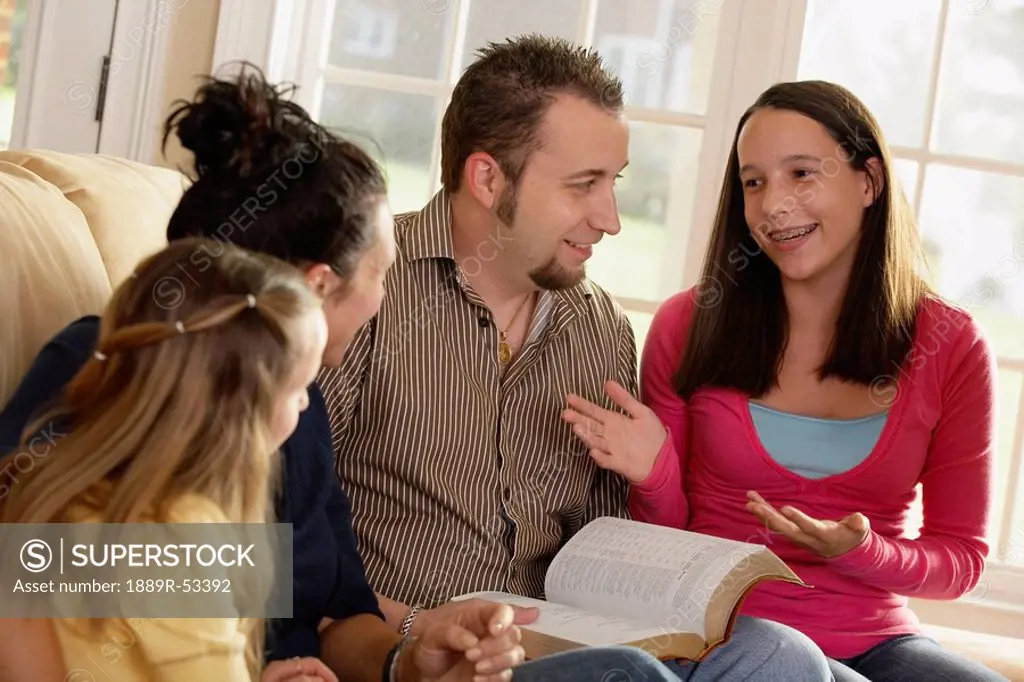 a family having a bible study