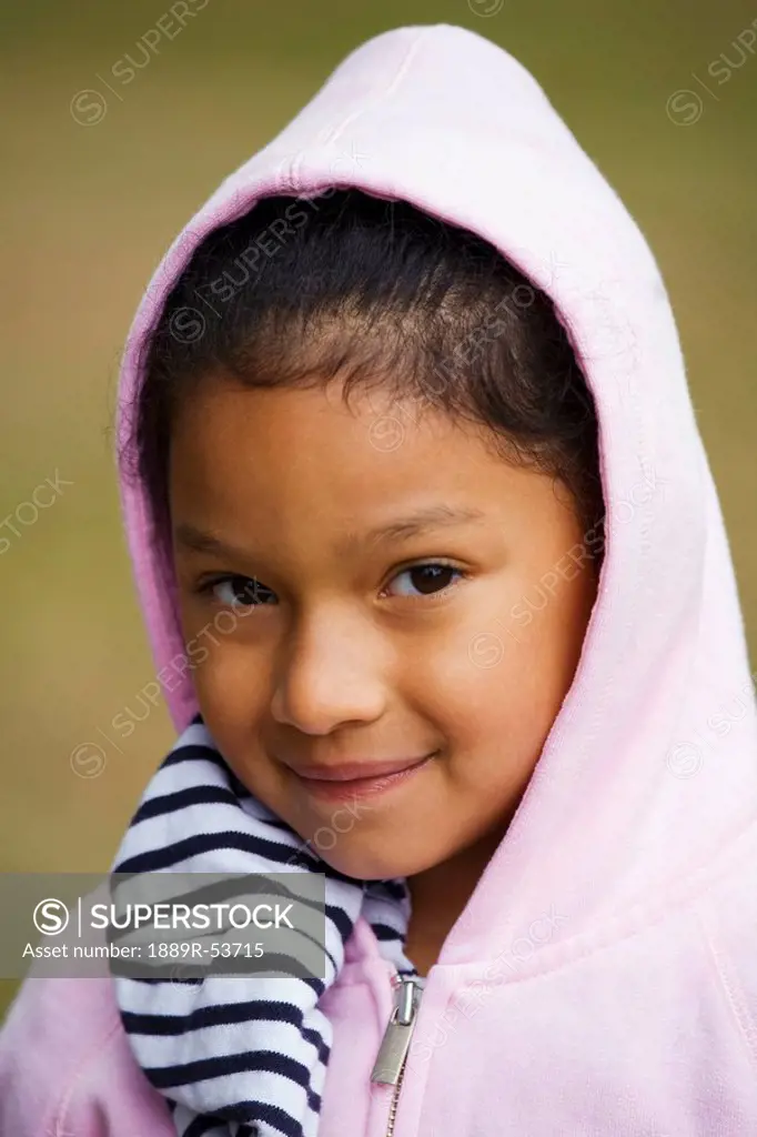 portrait of a girl in a pink hood