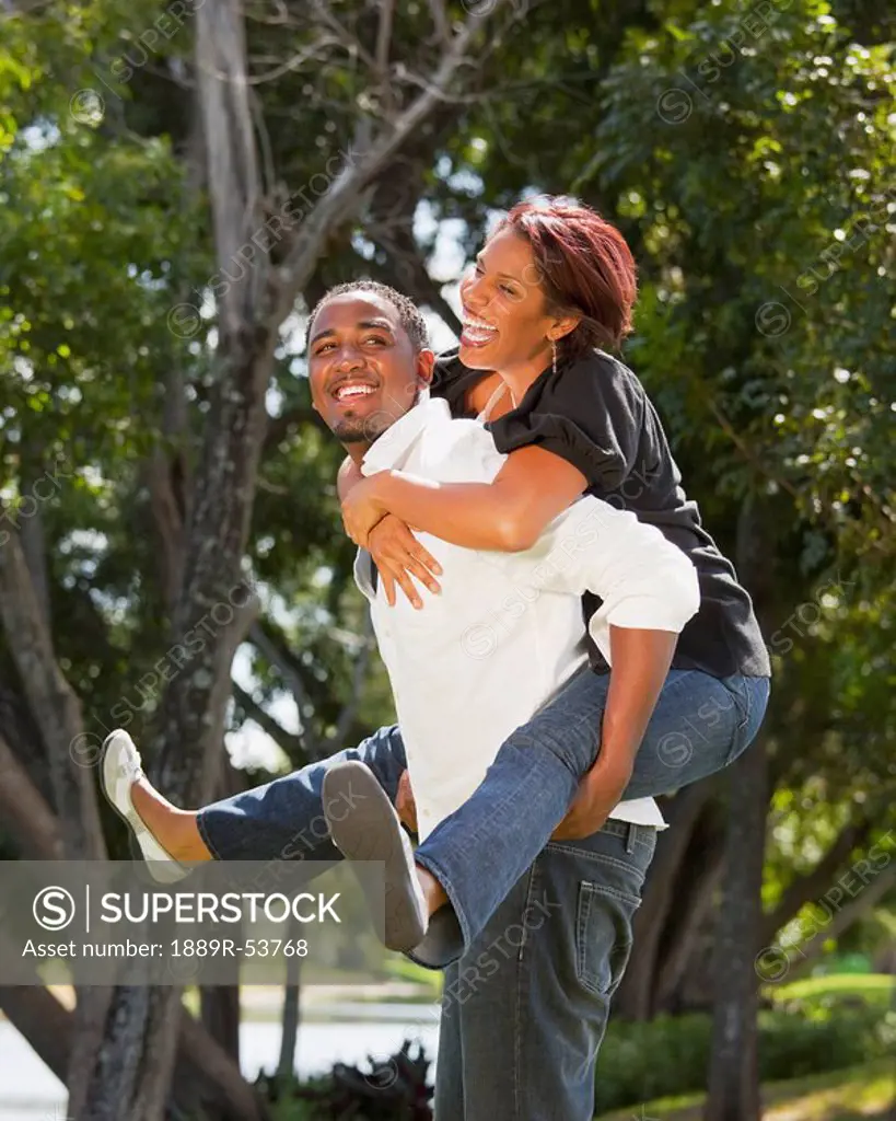 fort lauderdale, florida, united states of america, a couple having fun together in a park