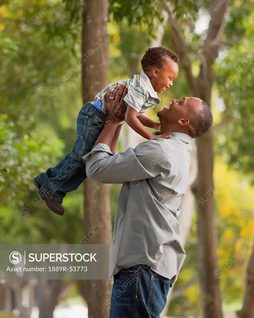 fort lauderdale, florida, united states of america, a father playing with his son