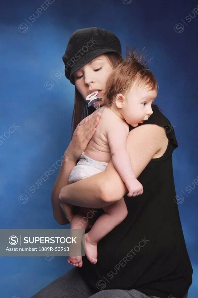 edmonton, alberta, canada, a mother holding her baby