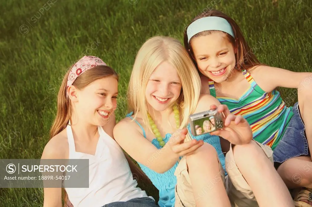 edmonton, alberta, canada, three girls taking a picture of themselves