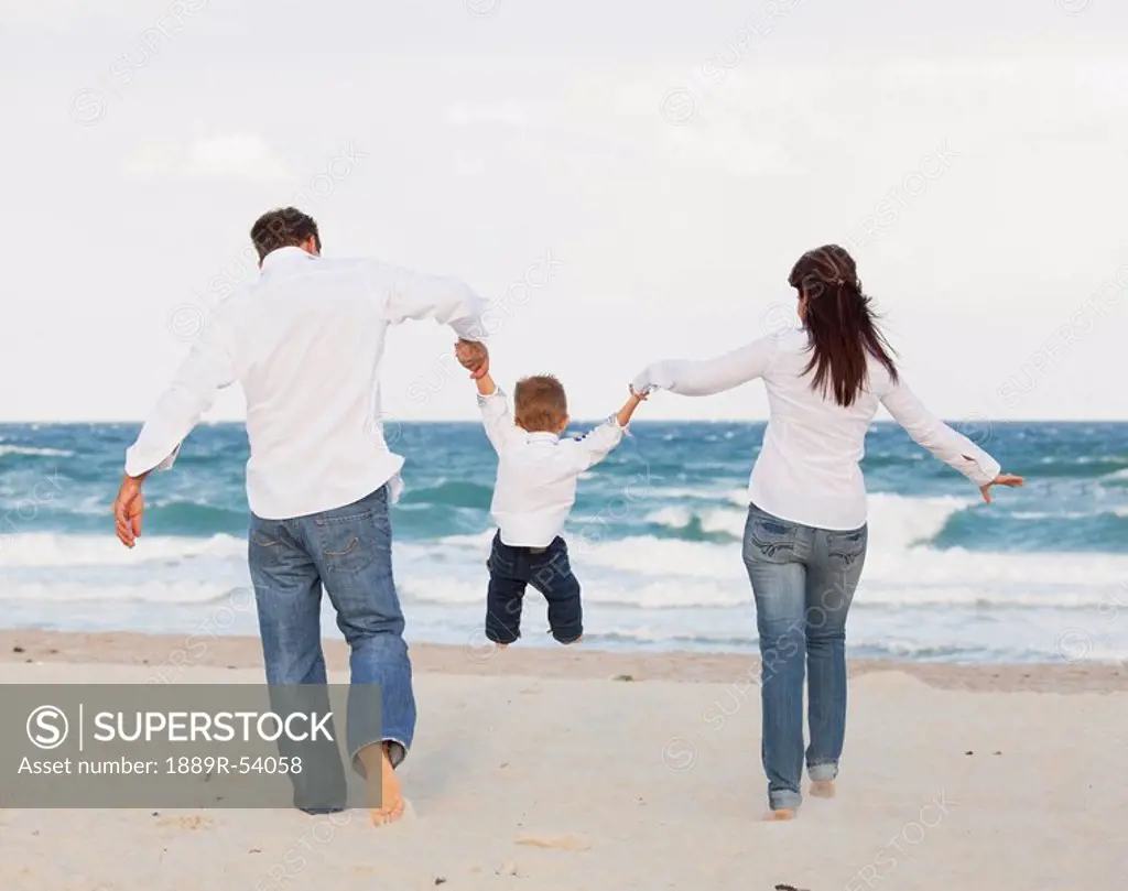 fort lauderdale, florida, united states of america, a family on the beach