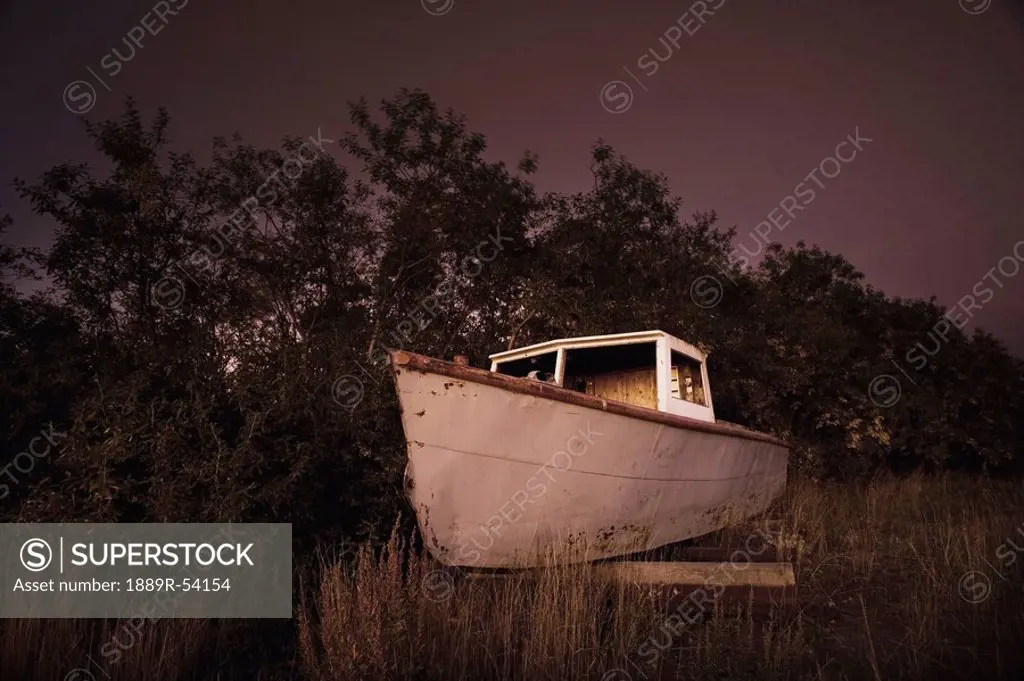 Inuvik, Northwest Territories, Canada, An Abandoned Ship On The Riverbank