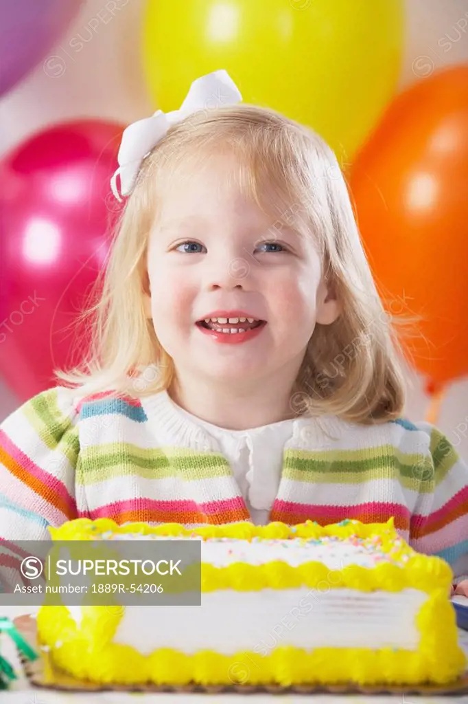 Knoxville, Tennessee, United States Of America, A Young Girl With Balloons And A Birthday Cake