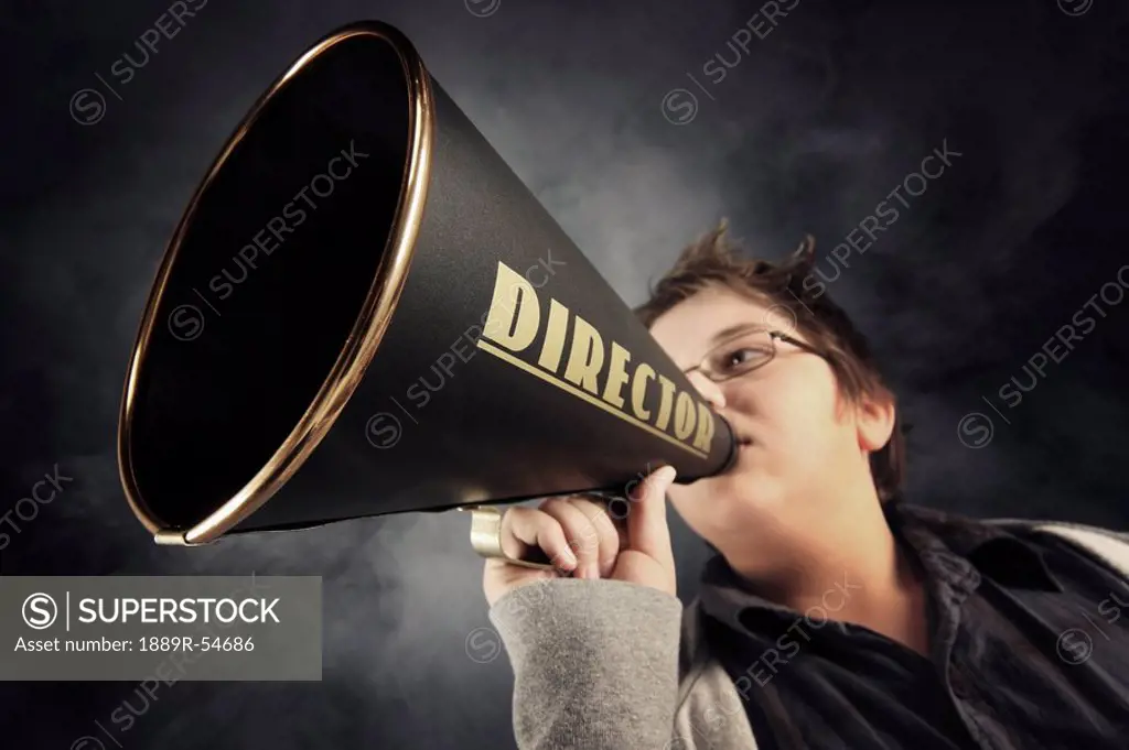 A Boy With A Megaphone Labeled ´director´