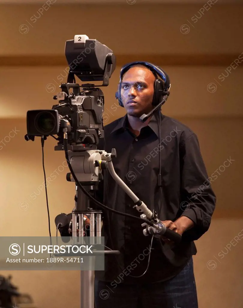 Fort Lauderdale, Florida, United States Of America, A Man Operating A Tv Camera