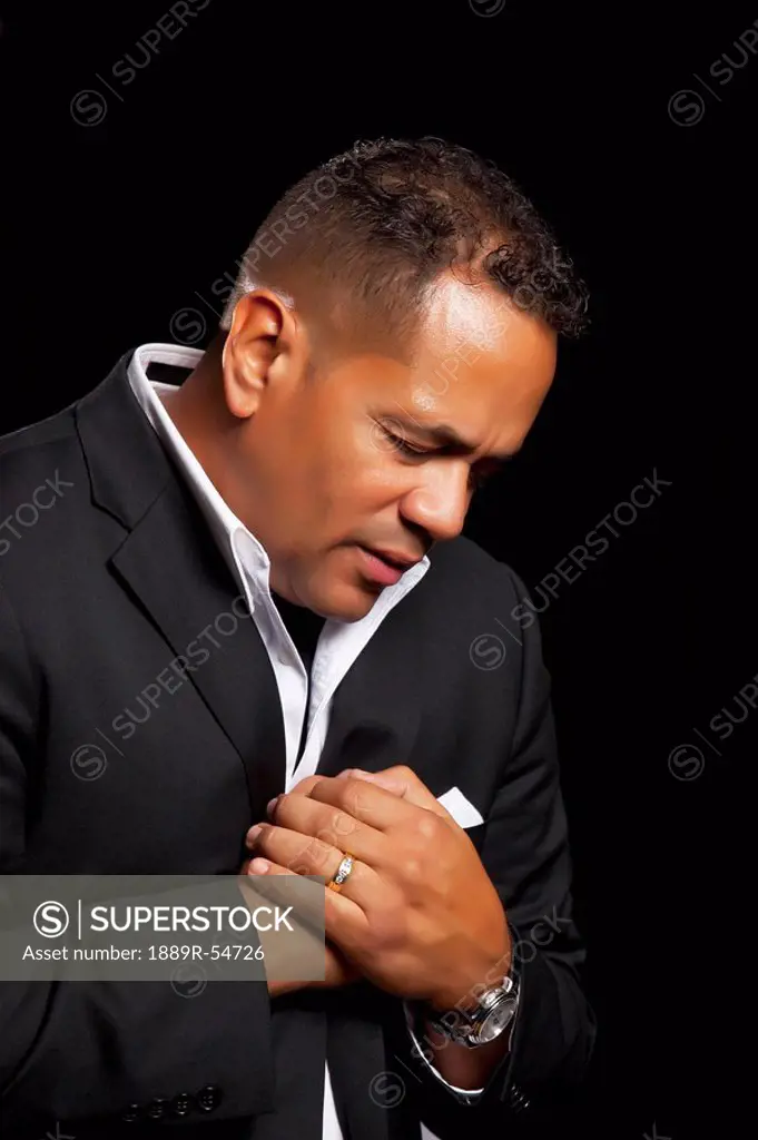 Fort Lauderdale, Florida, United States Of America, A Man With His Head Bowed In Prayer