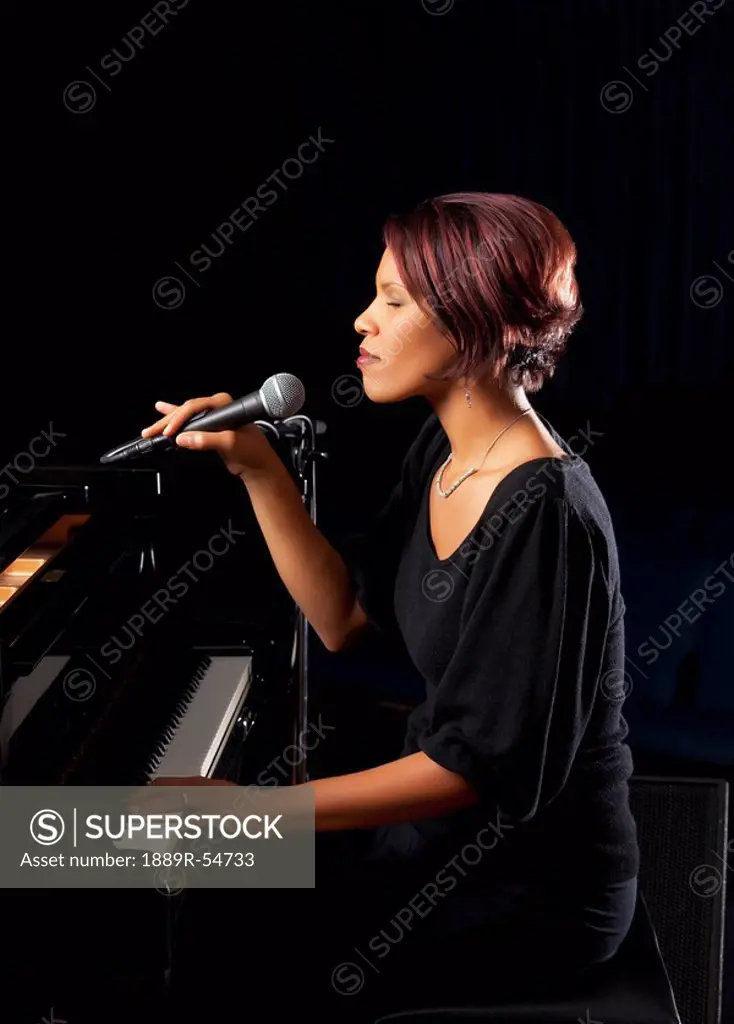 Woman Holding Microphone