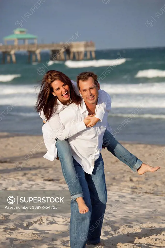 Fort Lauderdale, Florida, United States Of America, A Couple Having Fun On The Beach