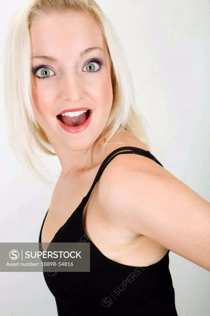 Portrait Of A Young Woman With A Surprised Look