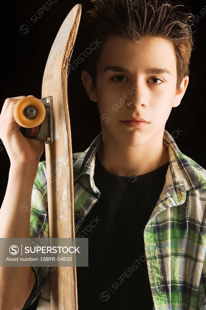 A Boy With A Skateboard