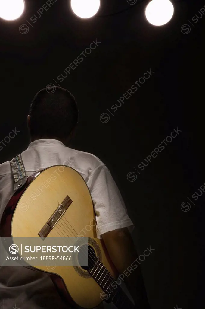 Man Man With A Guitar On A Strap