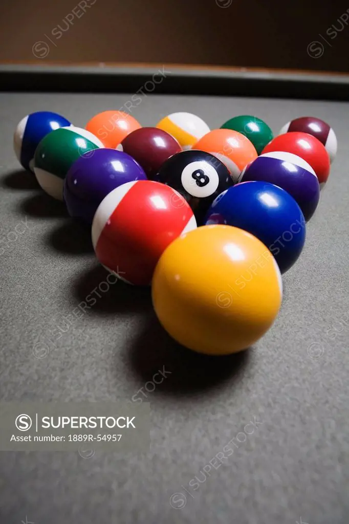 Pool Balls On A Billiard Table With The Eight Ball Facing Upwards