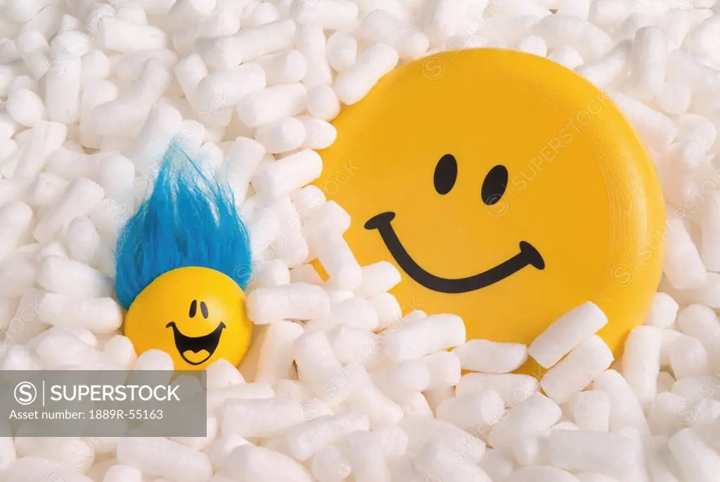 happy faces in styrofoam packing peanuts
