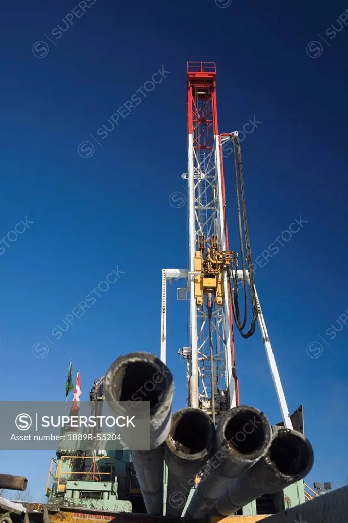 edson, alberta, canada, drilling rig with pipes in the foreground