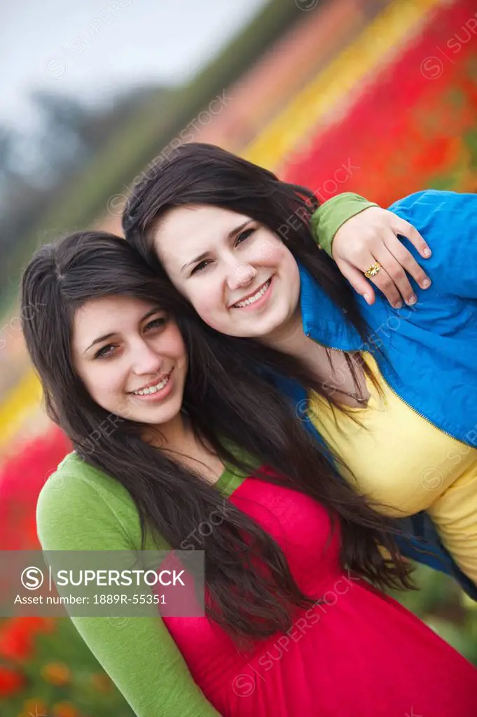 woodburn, oregon, united states of america, two teenage girls at the wooden shoe tulip farm