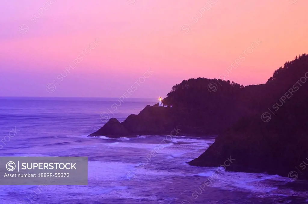 oregon, united states of america, heceta head lighthouse at morning light along the coast of the pacific ocean
