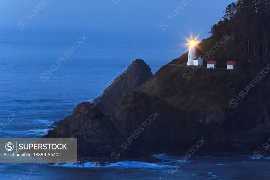 oregon, united states of america, heceta head lighthouse at sunset
