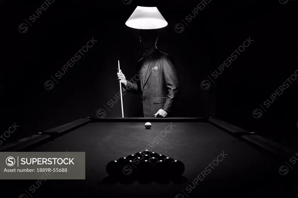 mystery pool player behind rack of billiard balls, edmonton, alberta, canada