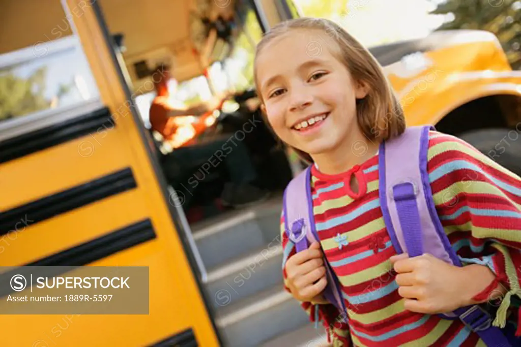 Child ready to board school bus