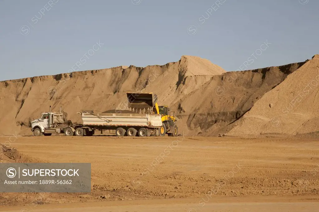 edmonton, alberta, canada, moving dirt on a construction site