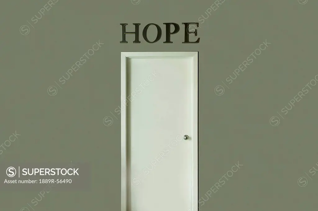a closed door with ´hope´ written above it, edmonton, alberta, canada