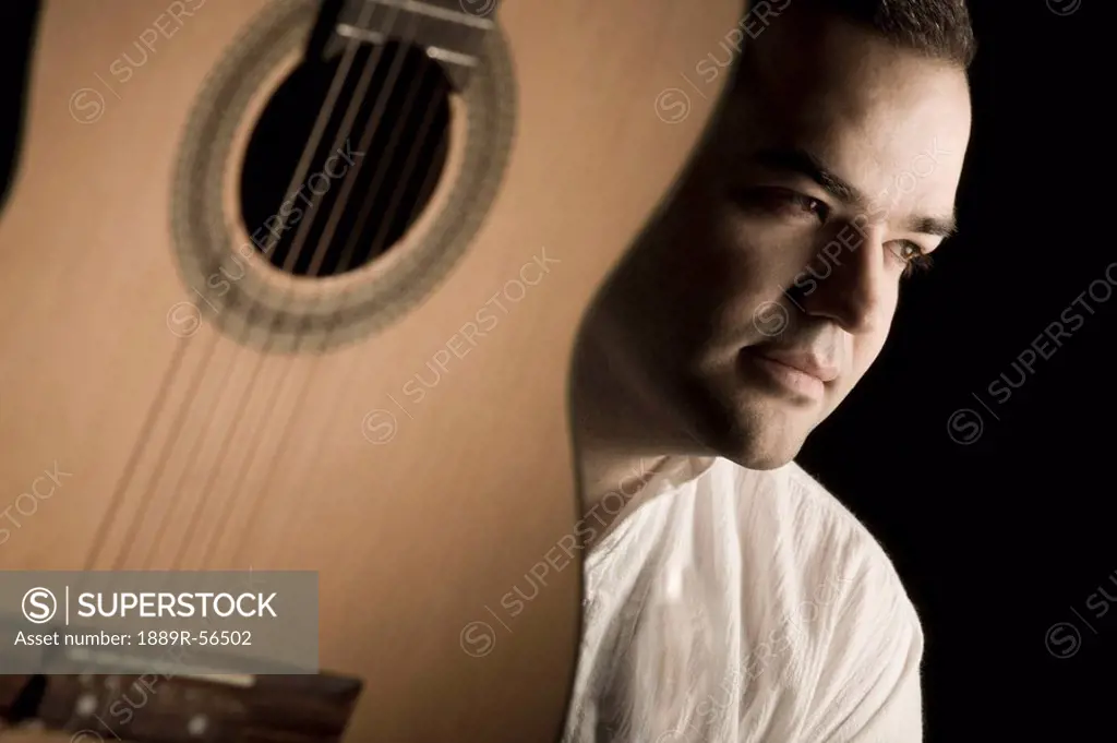 portrait of a man and a guitar, edmonton, alberta, canada