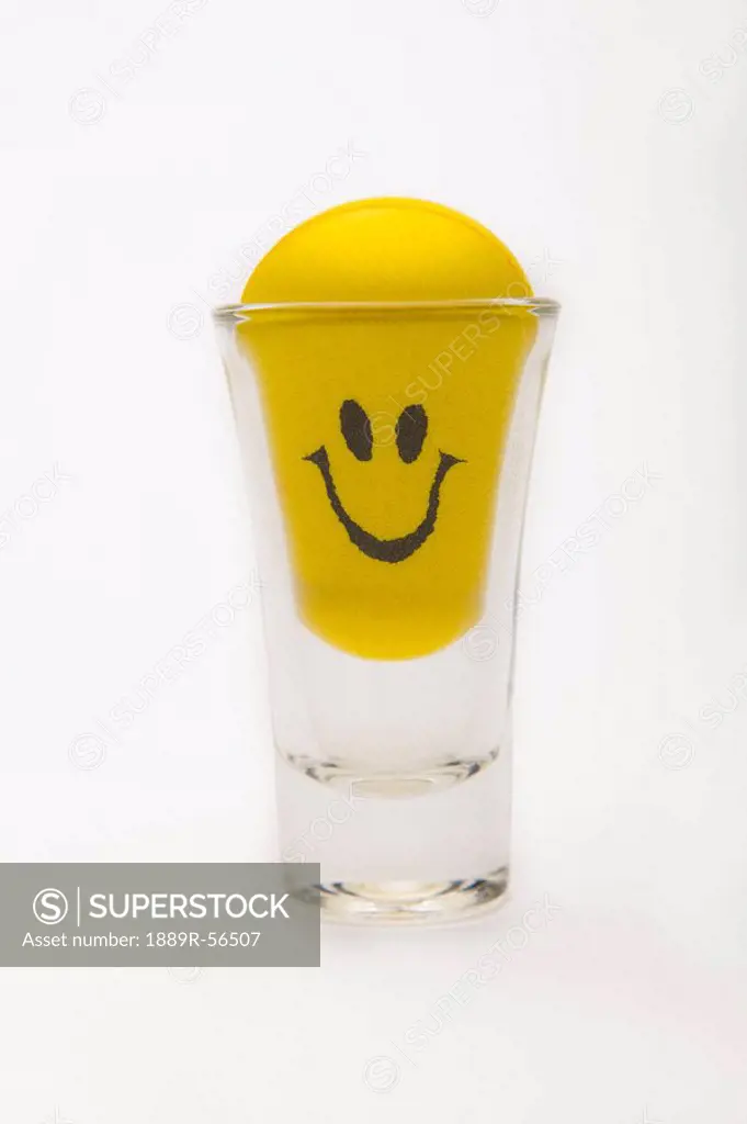 yellow happy face in a shot glass, edmonton, alberta, canada